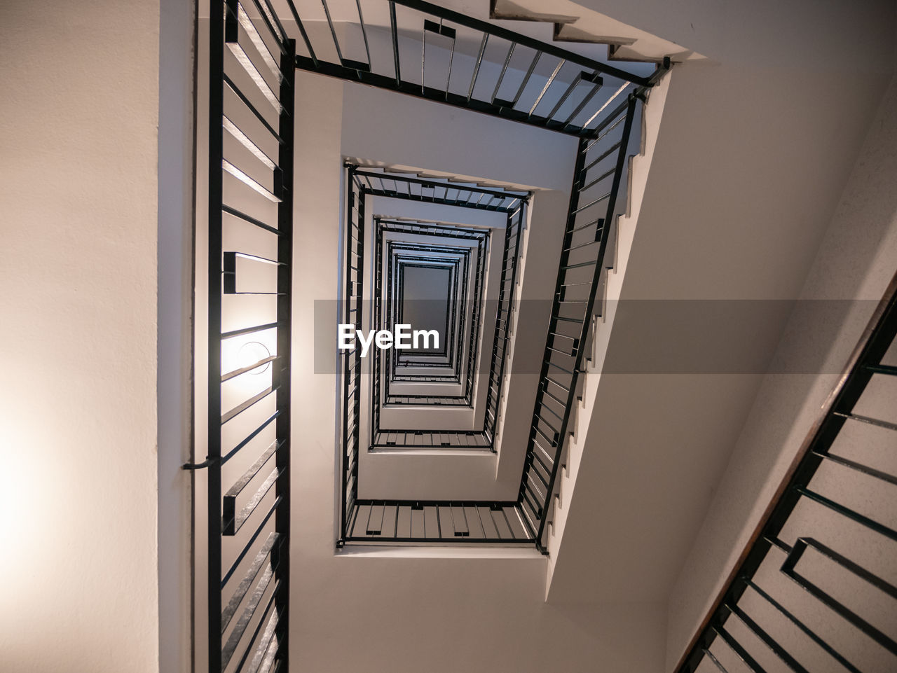 Low angle view of spiral staircase in building