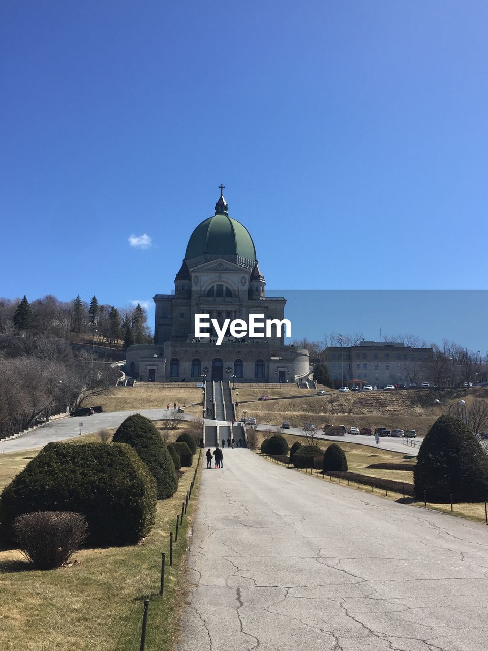 View of historic building  st. joseph oratory, against a clear blue sky. 