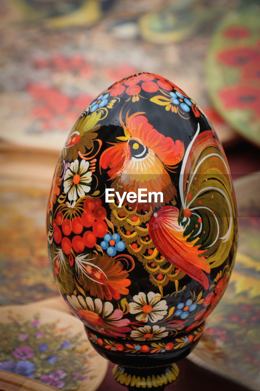 Close-up of patterned easter egg on table