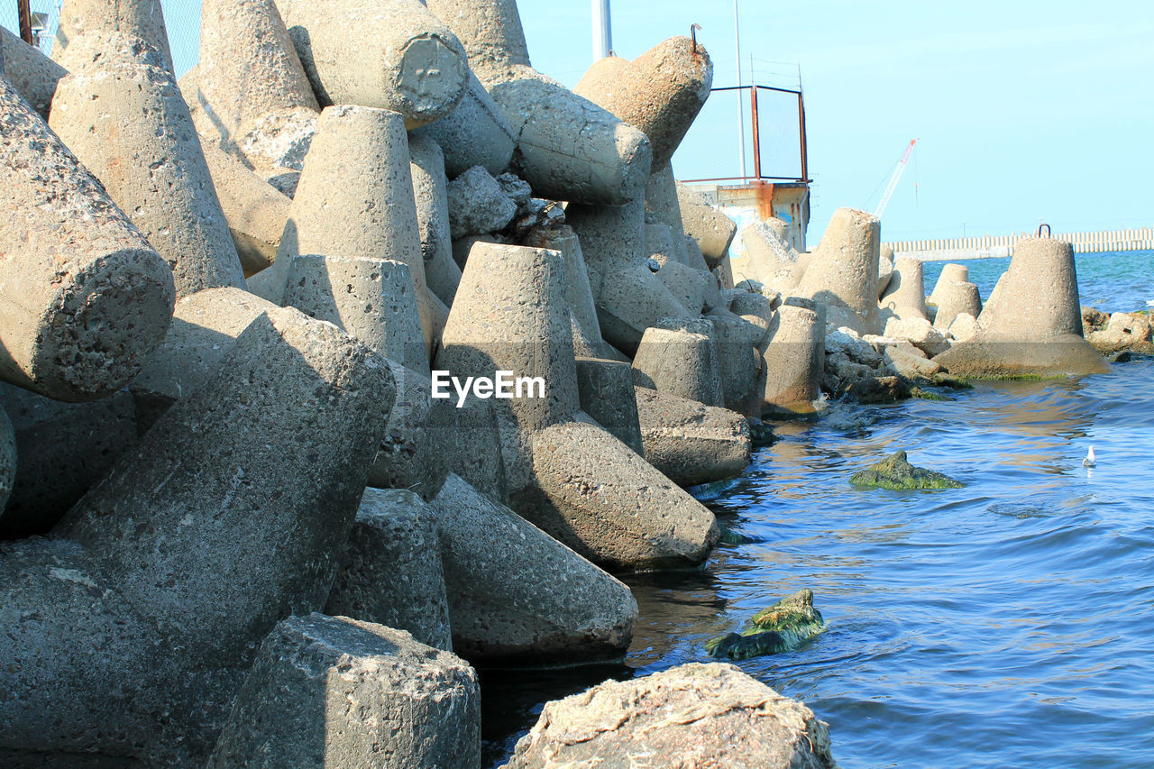 ROCKS AT SEA SHORE