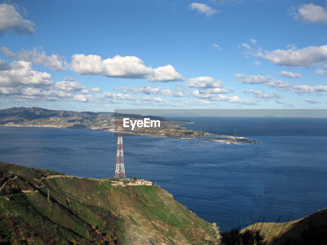 SCENIC VIEW OF BAY AGAINST CLEAR SKY