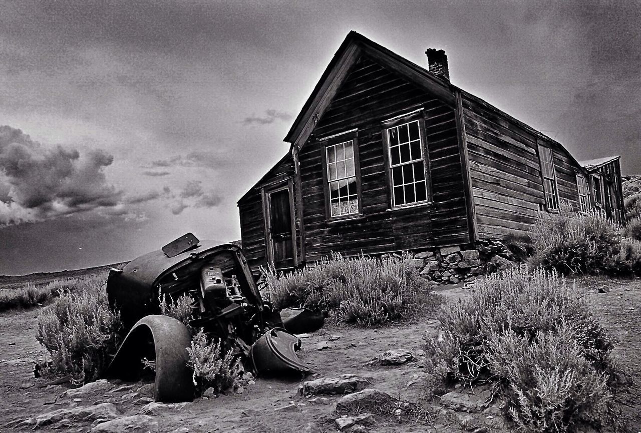 Low angle view of old house against sky