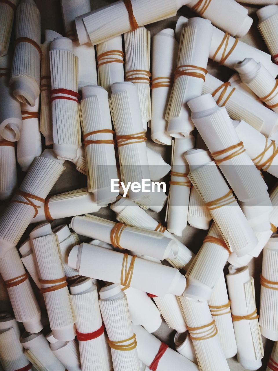 Full frame shot of rolled paper bundles