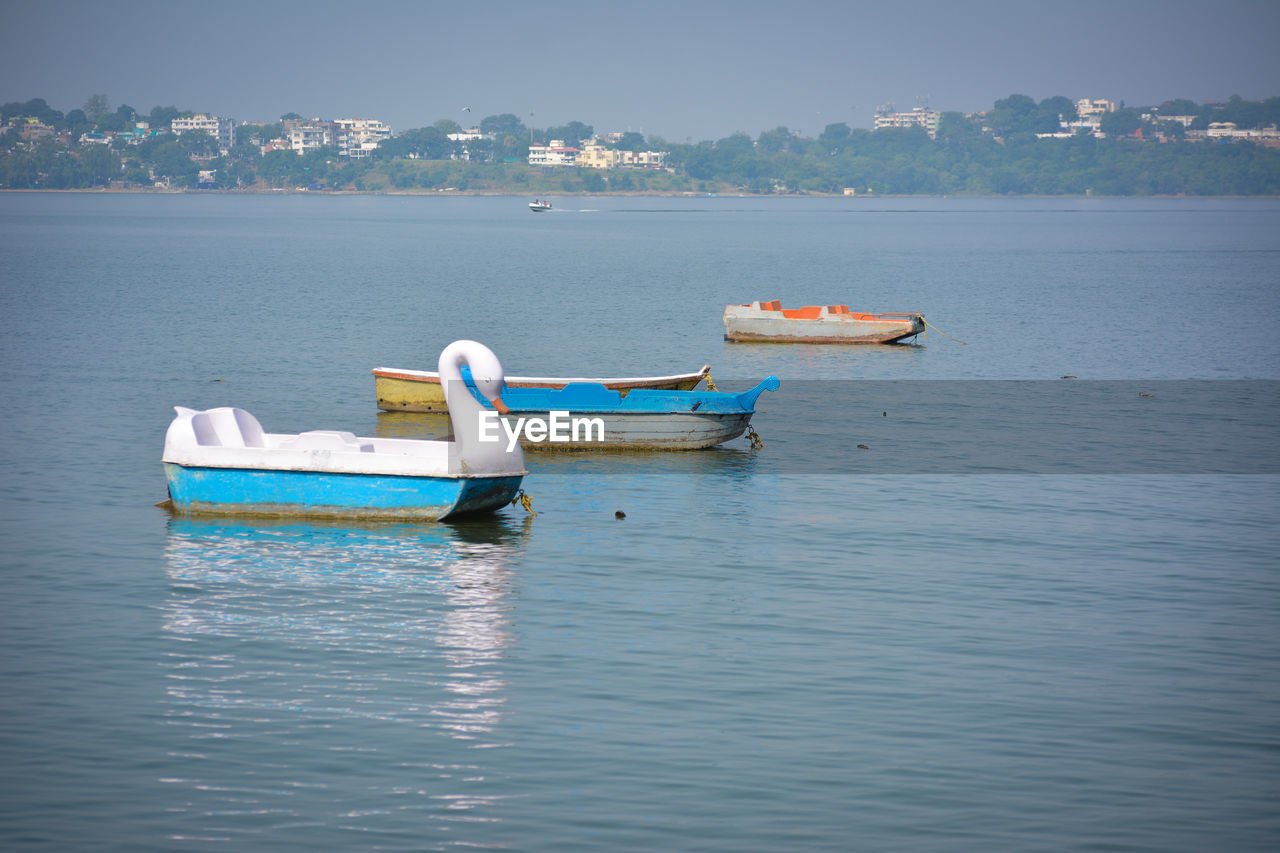 Boats in the upper lake at bhopal which is also known as 'city of lakes'.