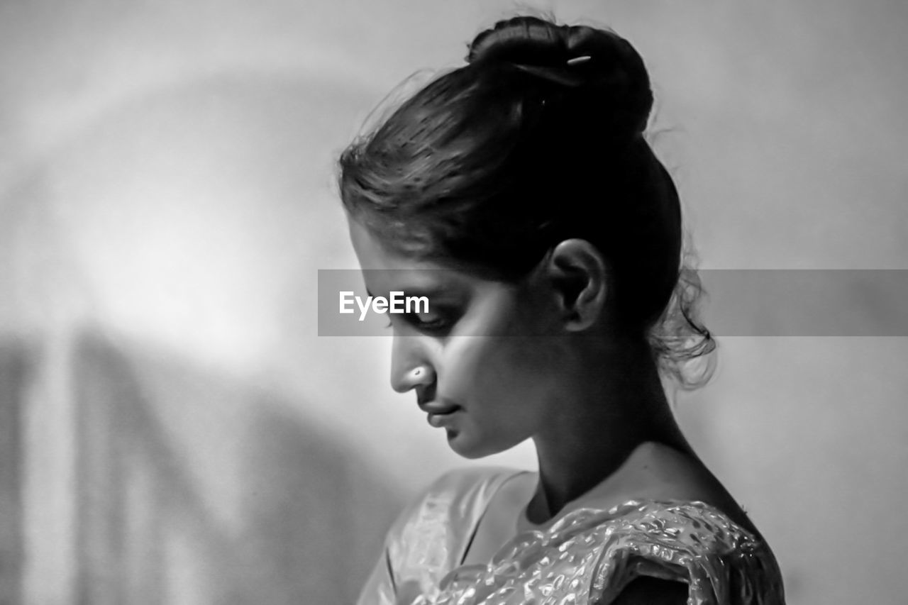 black and white, one person, women, black, portrait, adult, young adult, monochrome photography, chignon, headshot, bun, monochrome, fashion, female, bride, looking, hair bun, hairstyle, looking away, photo shoot, profile view, portrait photography, indoors, white, side view, emotion, human face, person, elegance, arts culture and entertainment, clothing