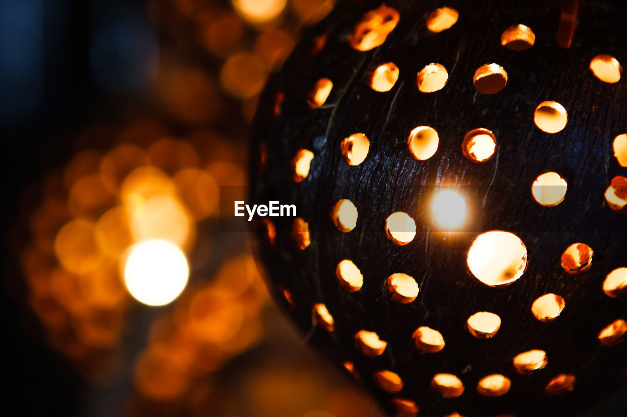 Close-up of illuminated lanterns