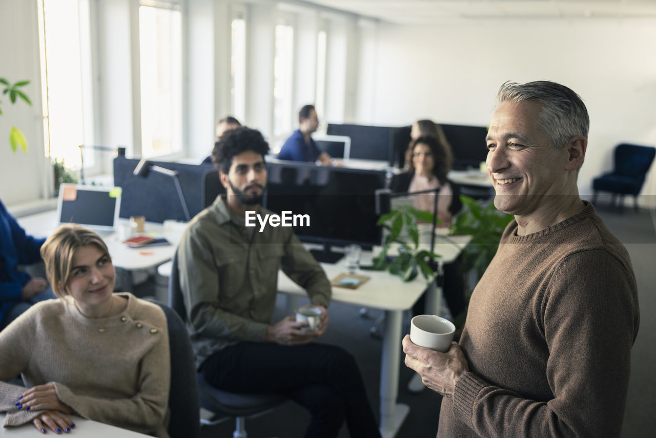 Group of business people having meeting in office