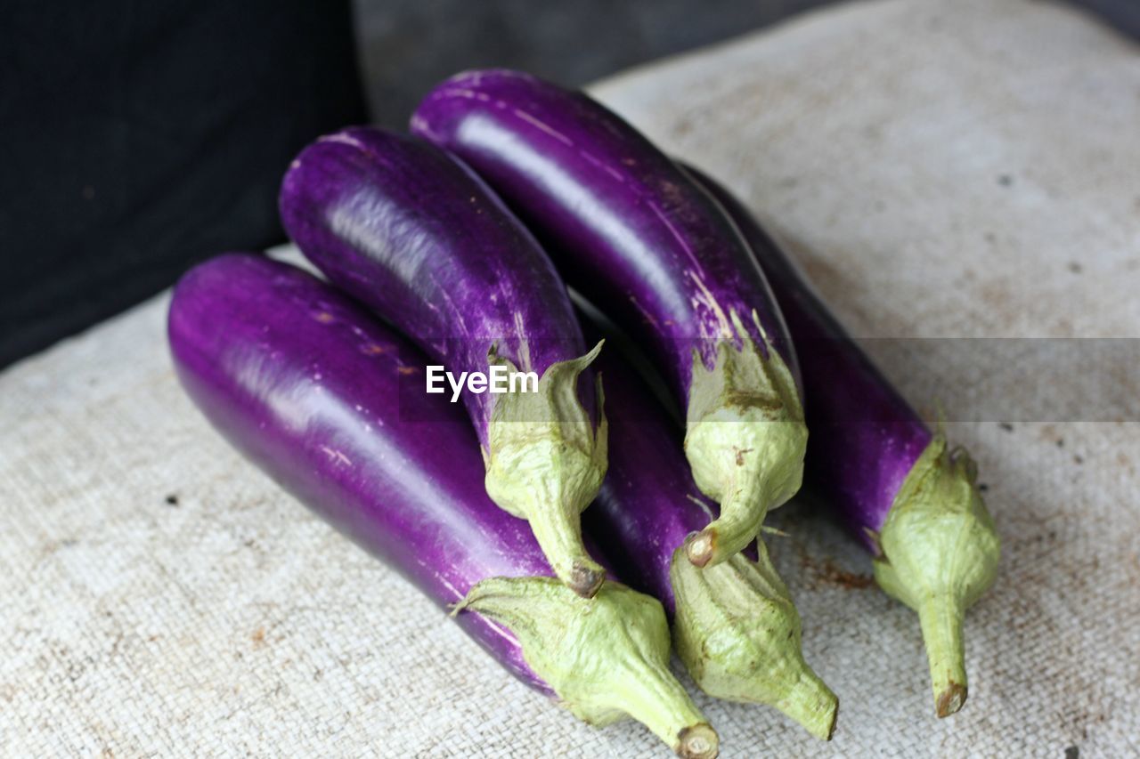 Close-up of eggplants on table