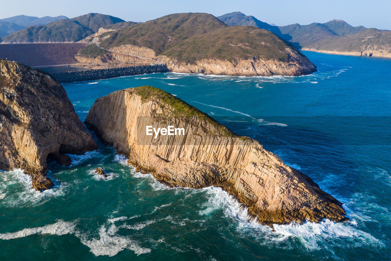 SCENIC VIEW OF SEA AND MOUNTAINS