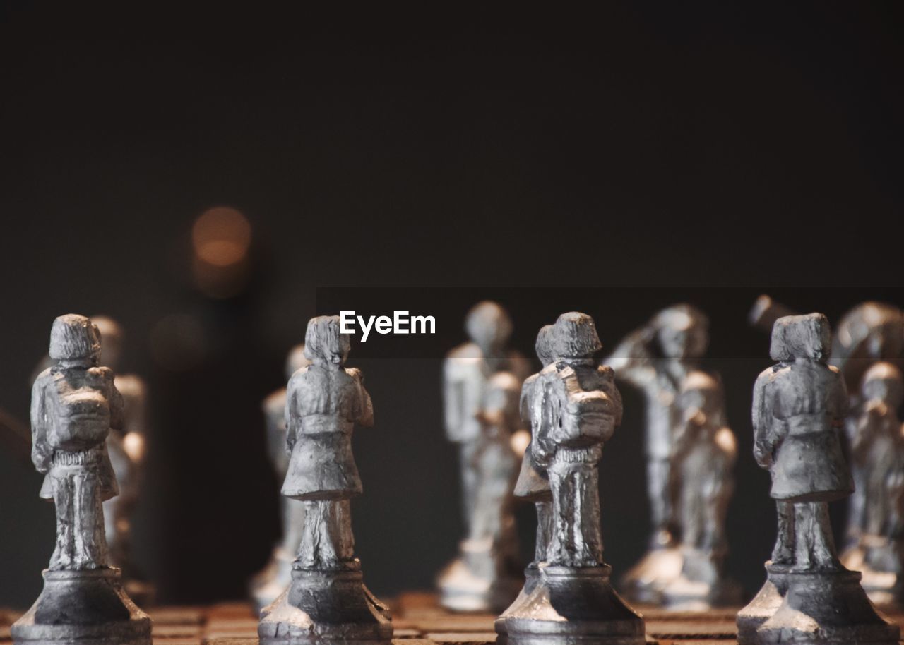 Close-up of chess against black background