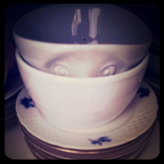 CLOSE-UP OF TEA CUP ON TABLE