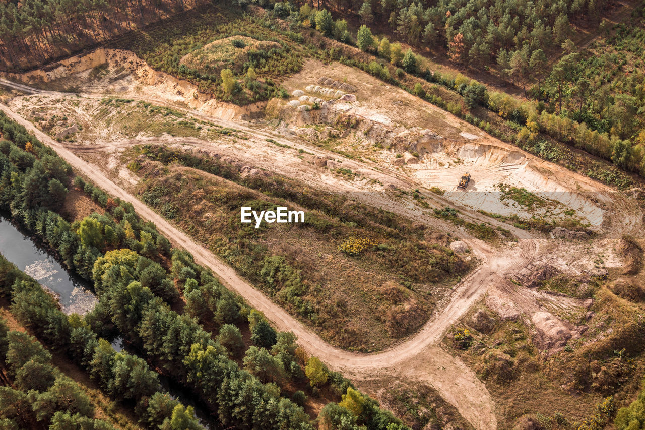 High angle view of road amidst trees