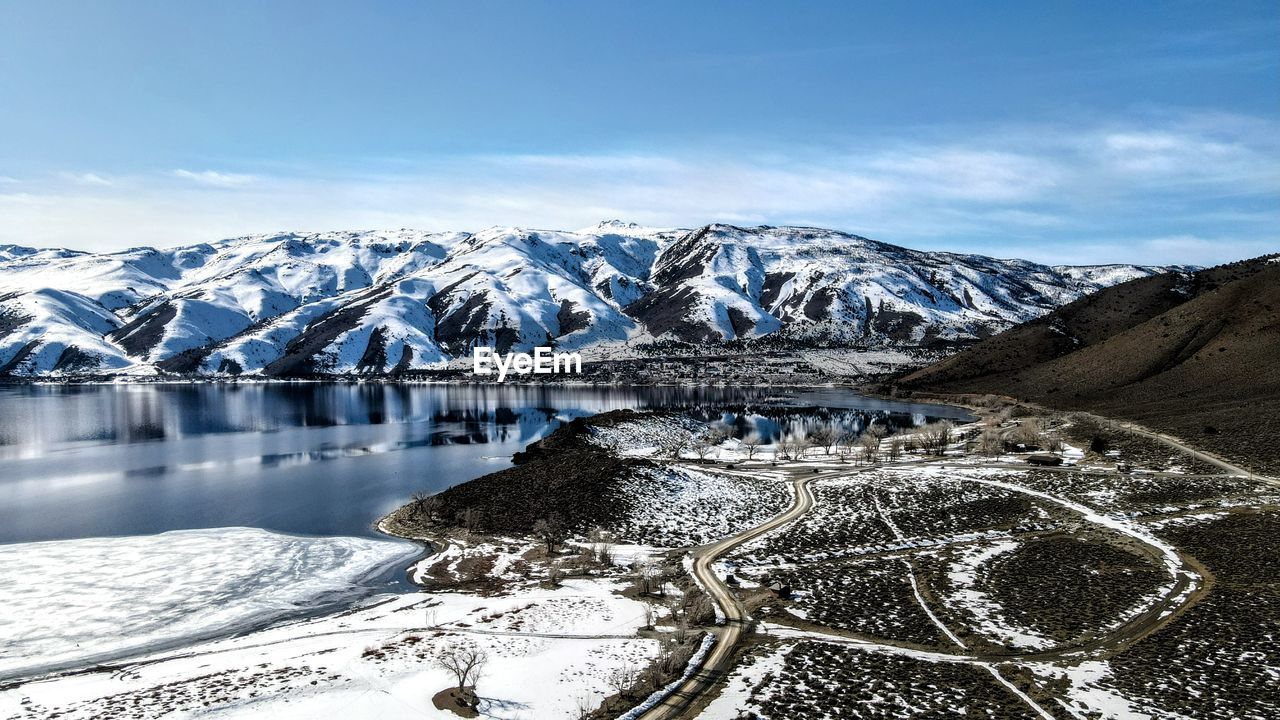 Scenic view of snowcapped mountains against sky., overlooking lake topaz, nevada.