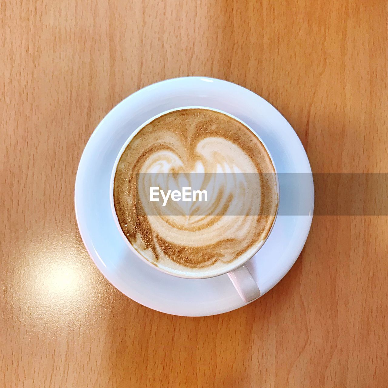 DIRECTLY ABOVE SHOT OF COFFEE ON TABLE