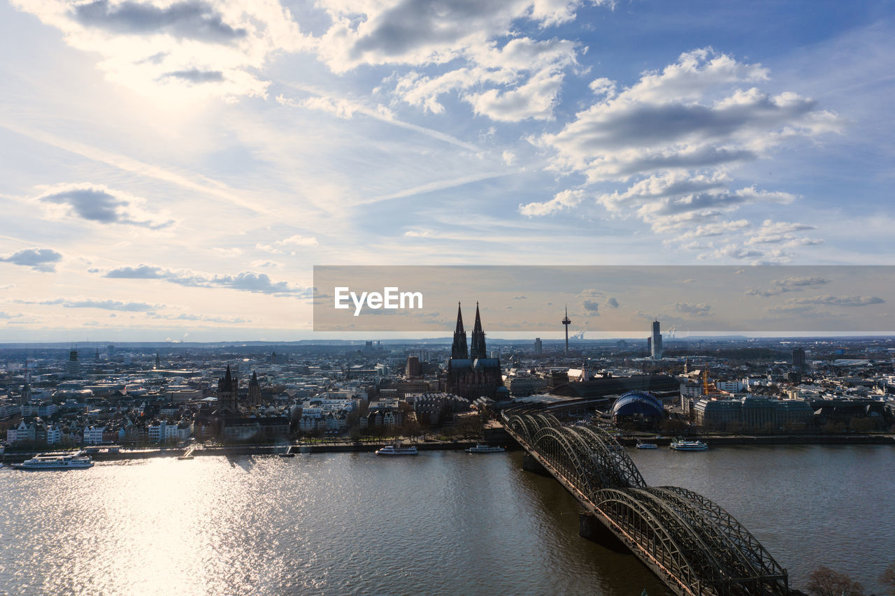 Silhouette of cityscape against sky