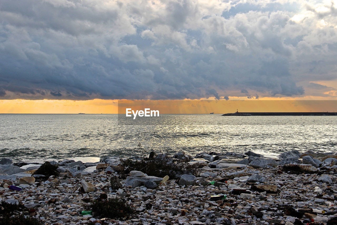 Scenic view of sea against sky during sunset