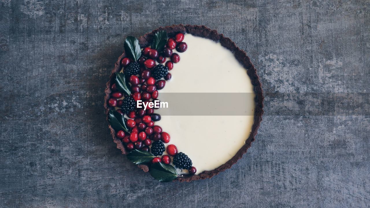 Directly above shot of fruits in tart on table