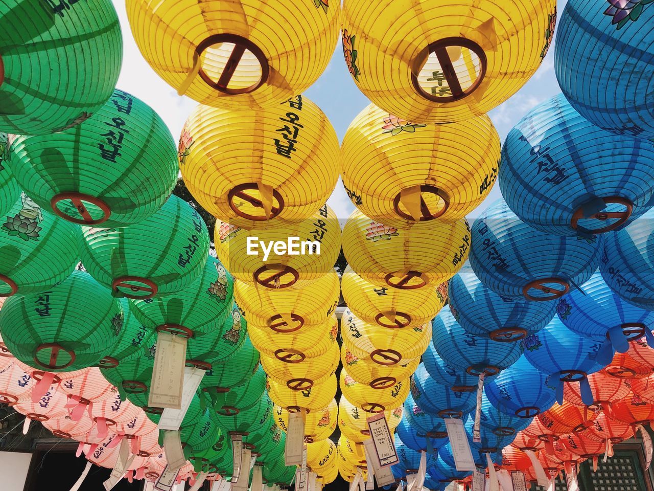 Low angle view of lanterns hanging in row