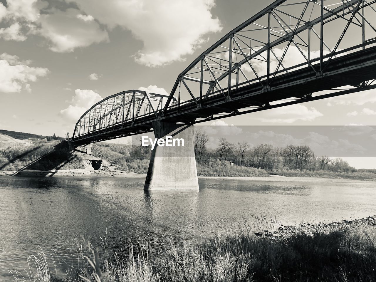 bridge, architecture, built structure, water, black and white, sky, transportation, monochrome, monochrome photography, nature, cloud, travel destinations, environment, reflection, travel, landscape, railway bridge, river, no people, scenics - nature, alloy, beauty in nature, steel, outdoors, fog, rail transportation, tourism, tranquility, city, tranquil scene, plant, business finance and industry, day, metal, cantilever bridge, low angle view, mode of transportation, land