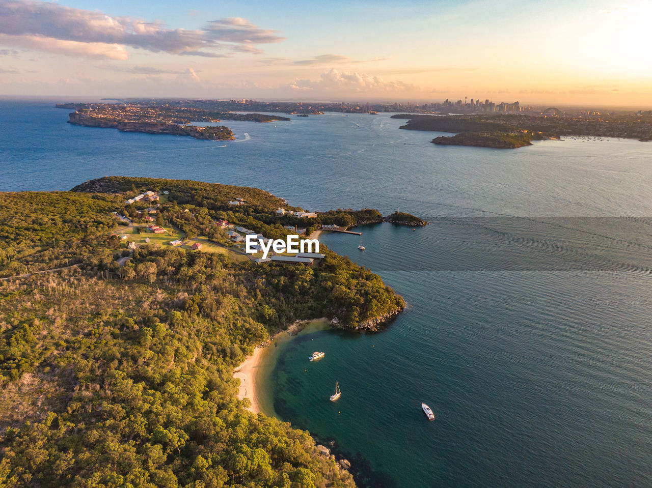 Drone view of quarantine station in sydney harbour. north head, south head and cbd in the back.