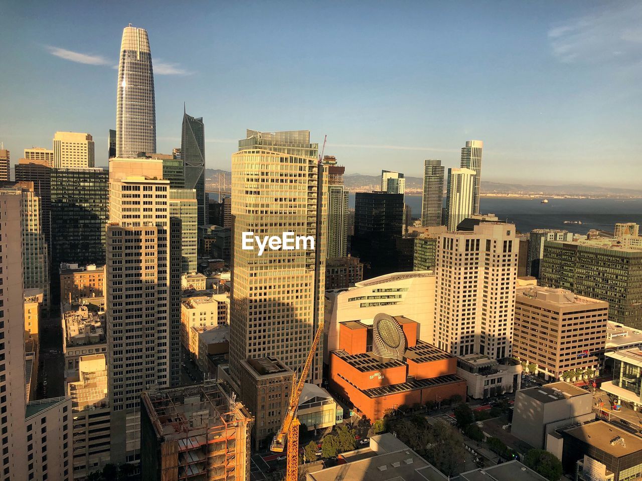 HIGH ANGLE VIEW OF BUILDINGS AGAINST SKY