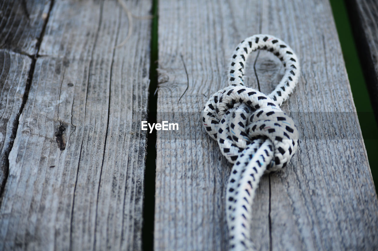 Close-up of rope on table