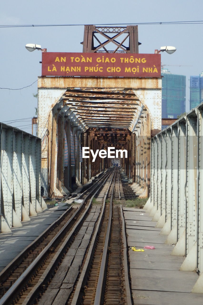 Text at railway bridge