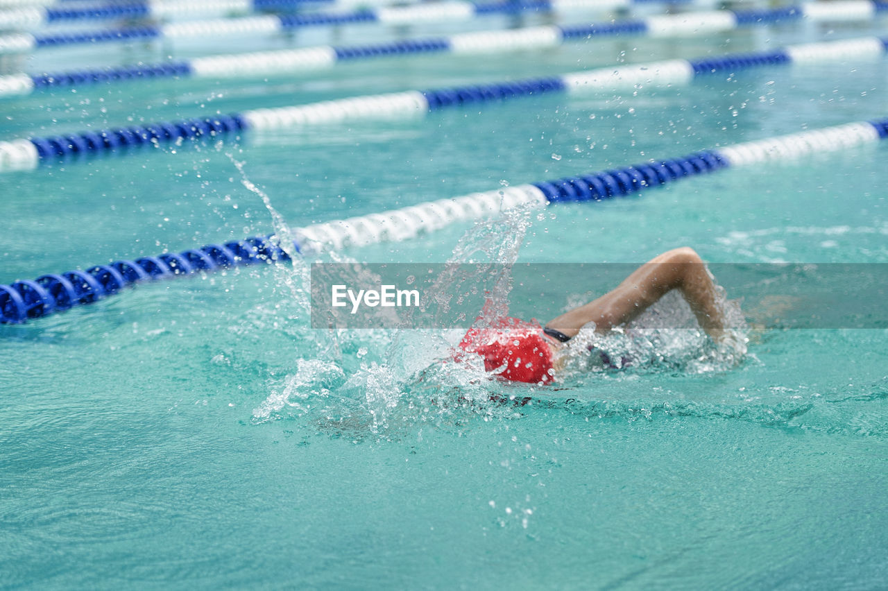 Girl swimming in pool