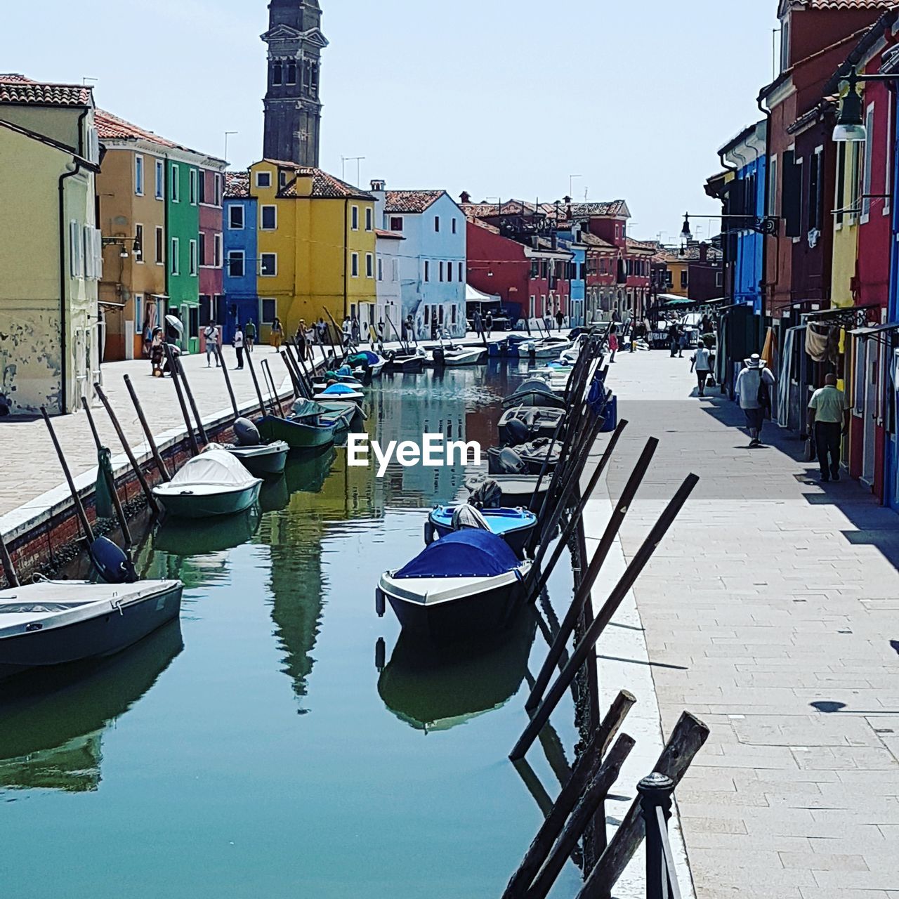 BOATS MOORED IN HARBOR