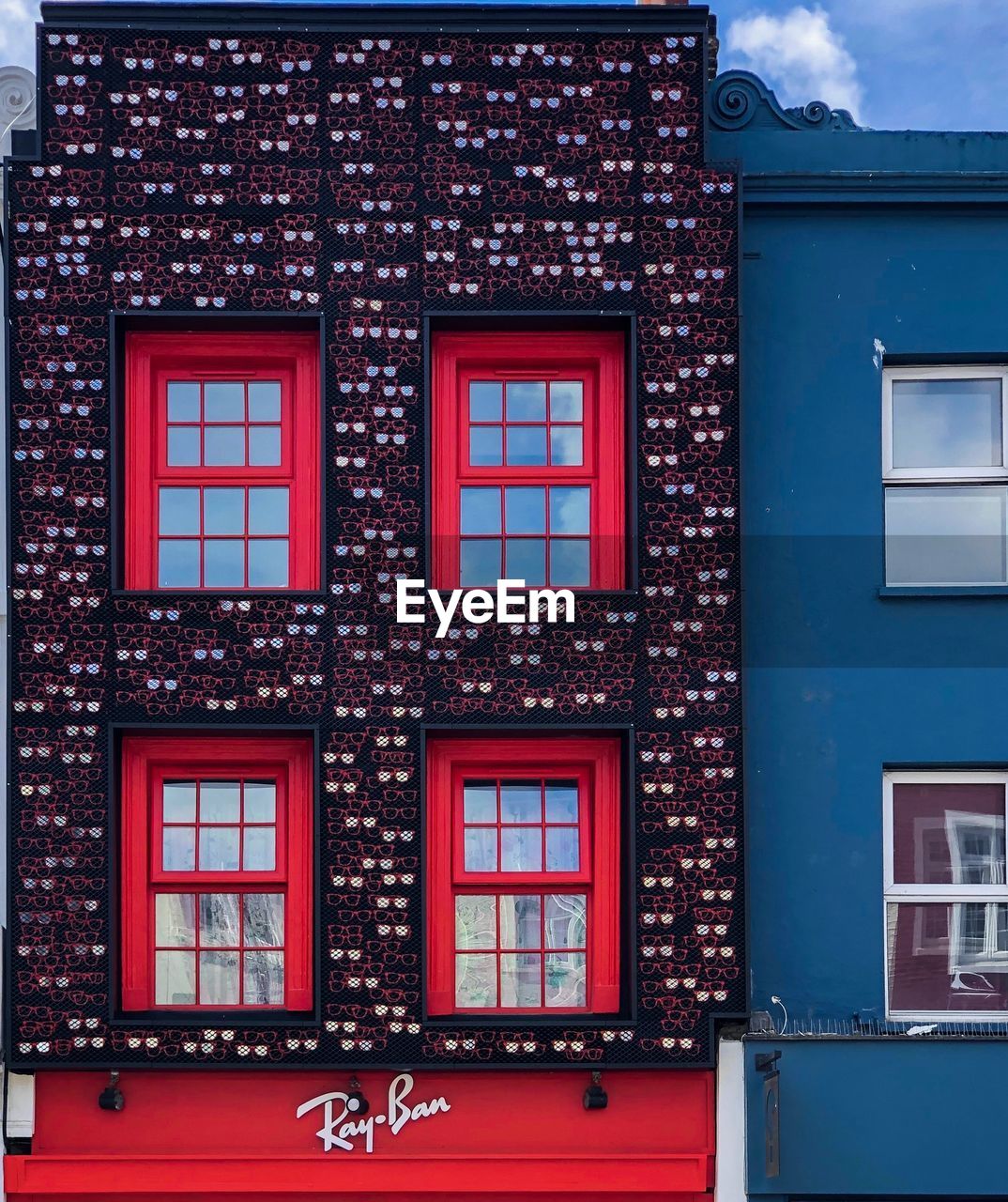 LOW ANGLE VIEW OF RED BUILDING