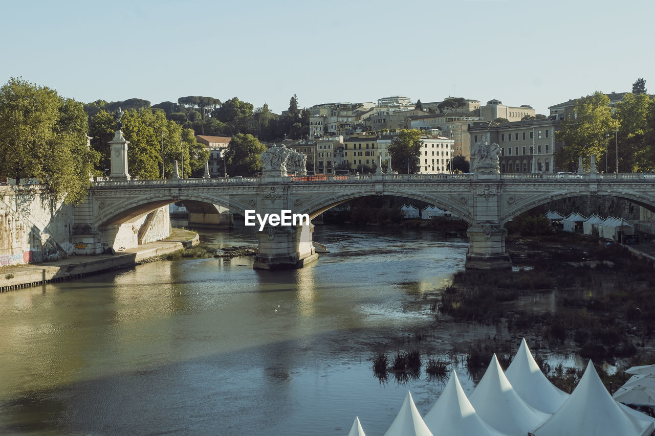 BRIDGE OVER RIVER AGAINST CLEAR SKY