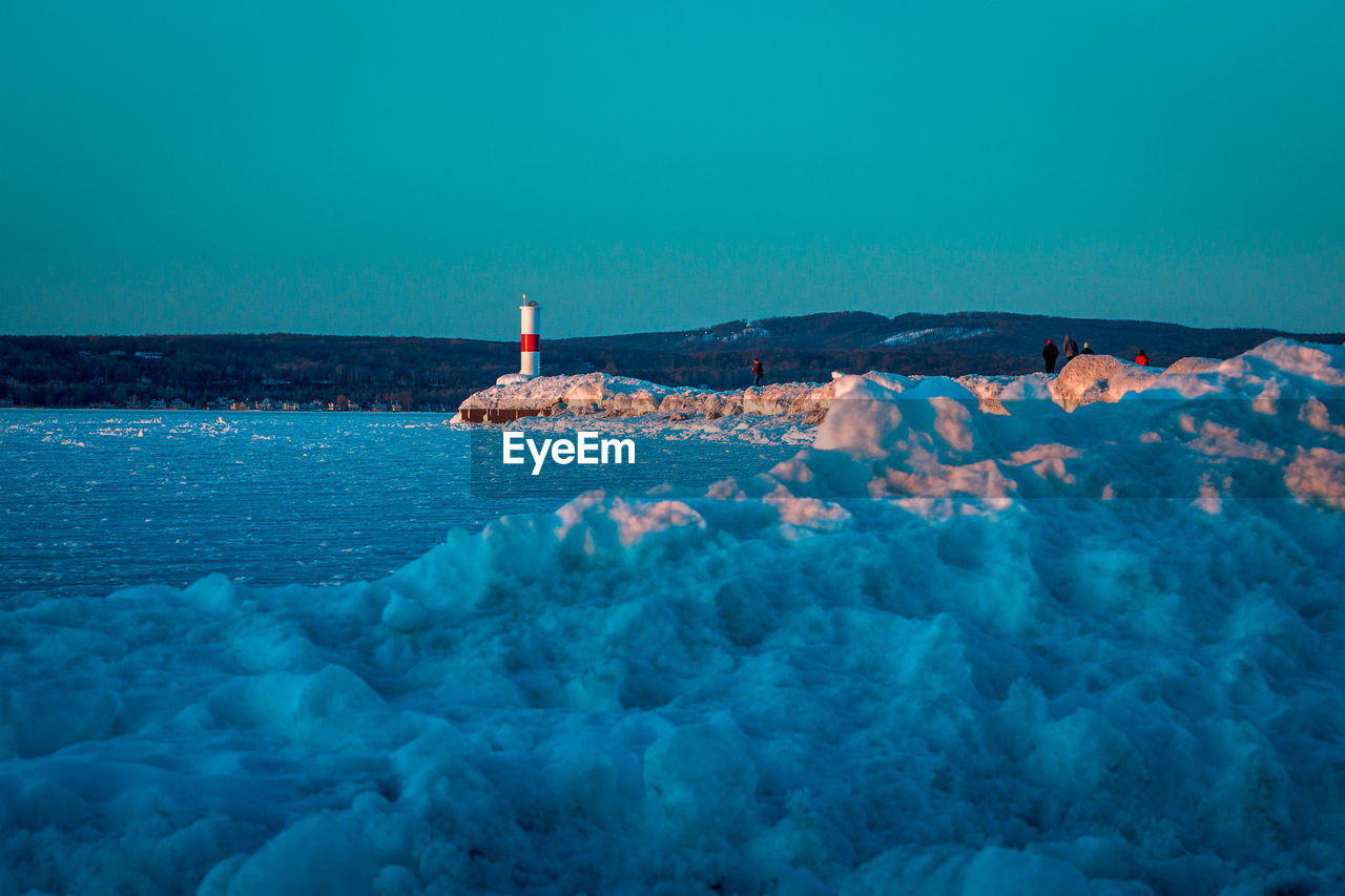 Beautiful sunset shot of the light house in petoskey michigan during sunset