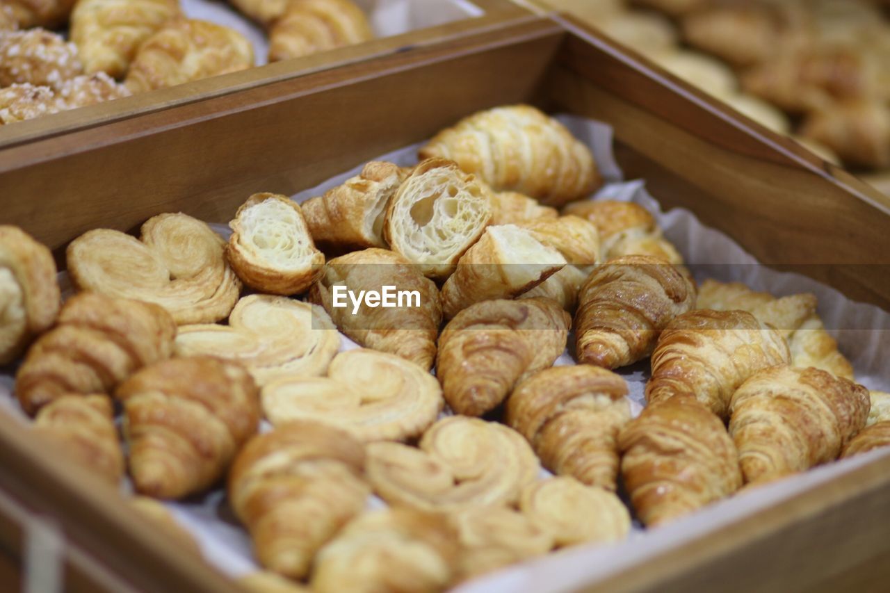 High angle view of baked food in container for sale at store