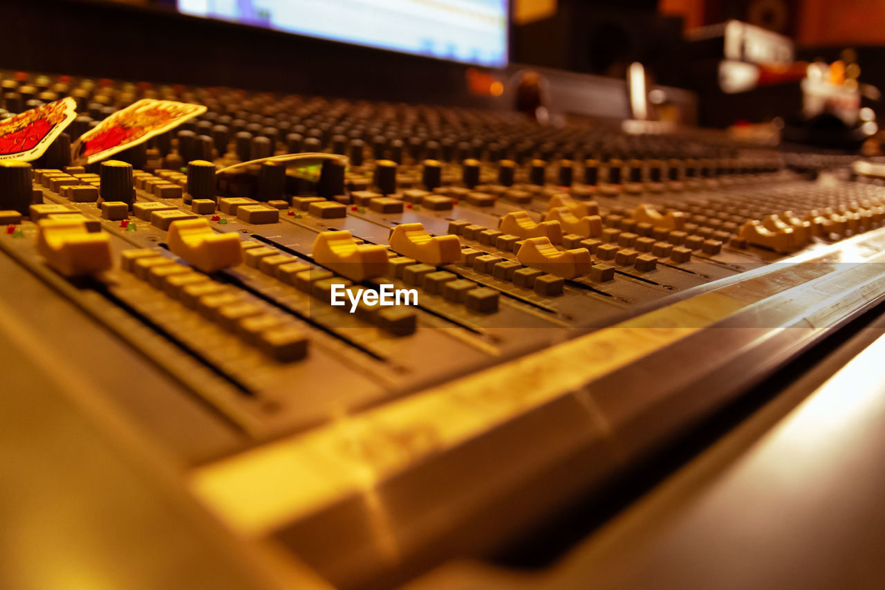 close-up of sound mixer at night