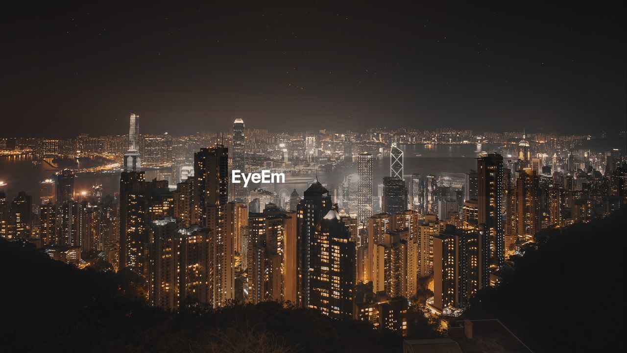 Illuminated buildings in city at night