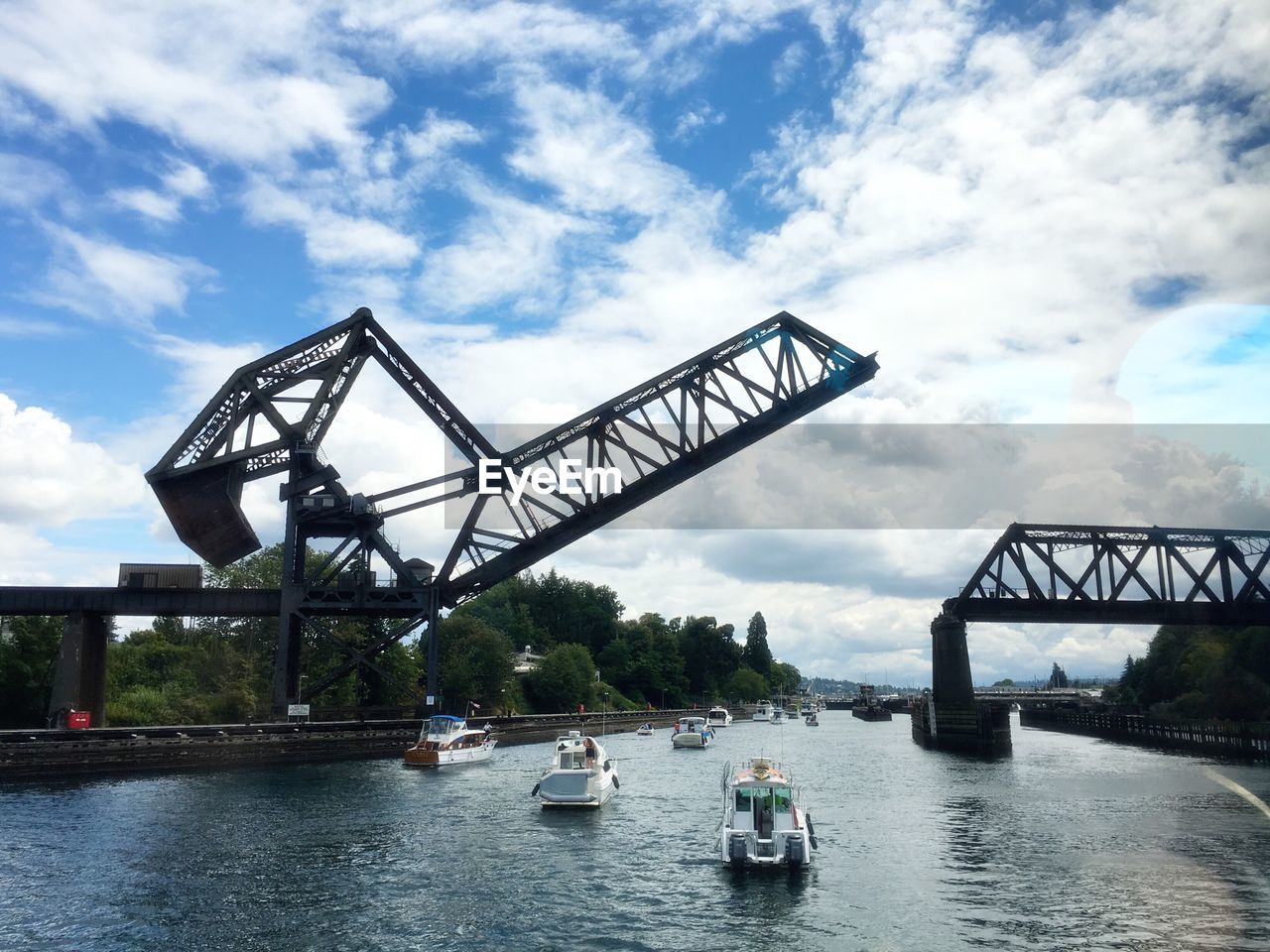 Drawbridge against cloudy sky