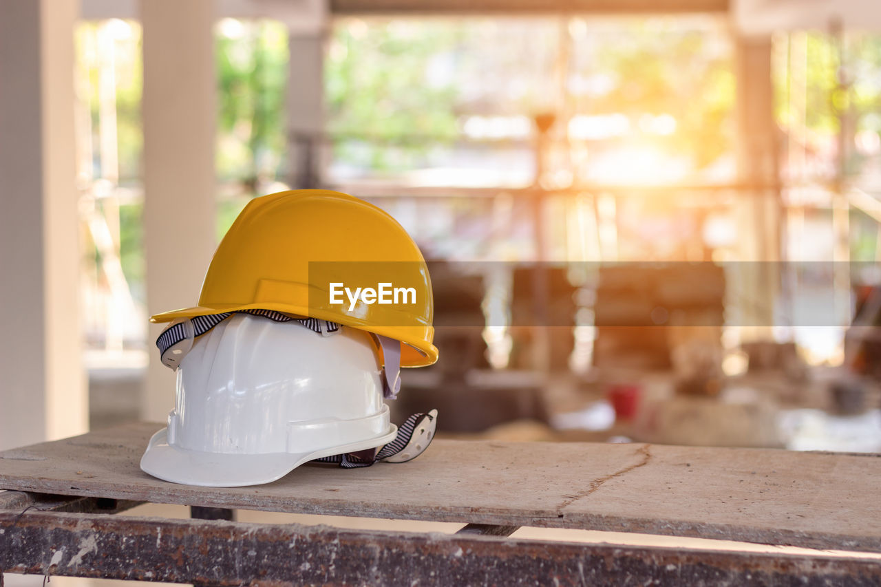 Hardhats on table in old building