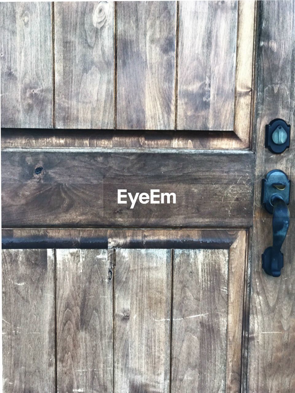 CLOSE-UP OF WOODEN DOOR