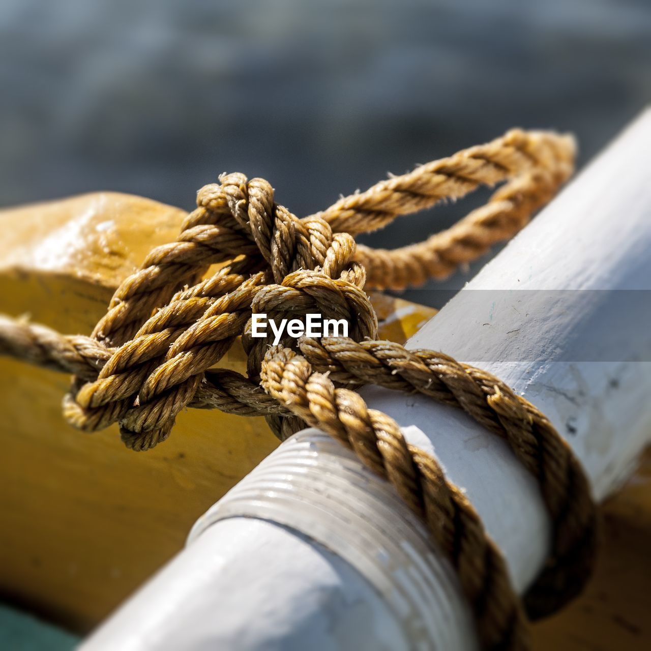 Close-up of ropes tied on rope