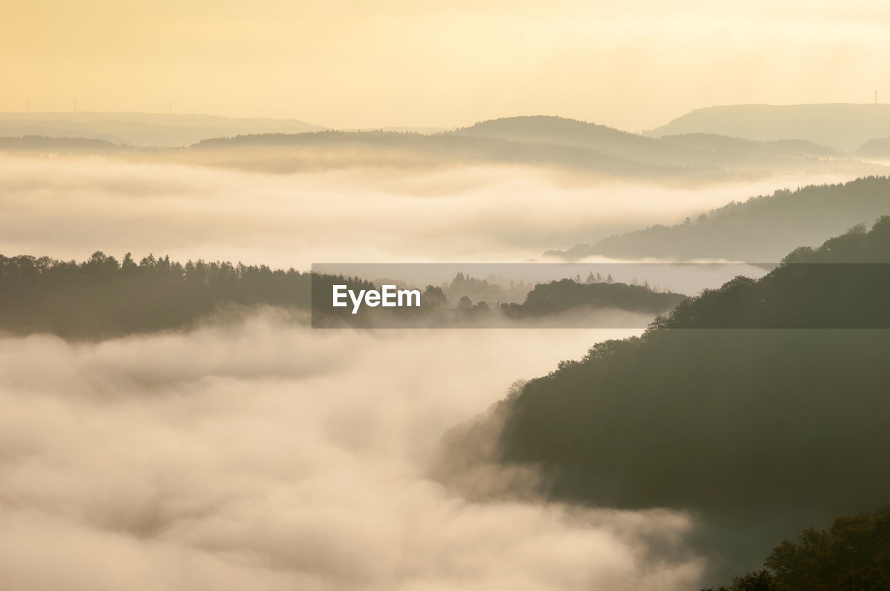 Scenic view of landscape against sky during sunset