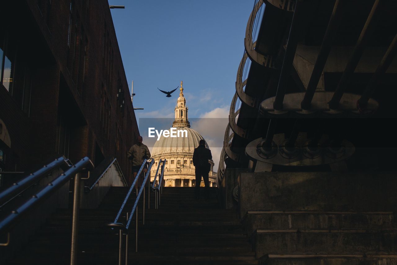 Low angle view of steps leading towards st paul cathedral against sky