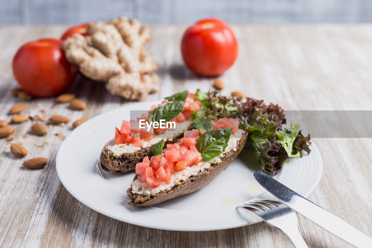 CLOSE-UP OF BREAKFAST ON TABLE