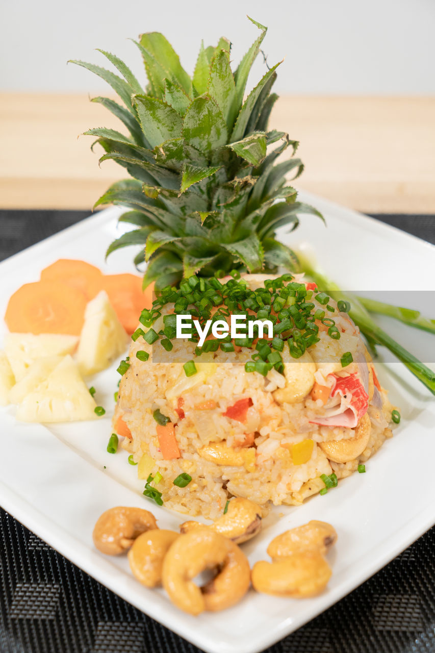 HIGH ANGLE VIEW OF FOOD SERVED ON TABLE