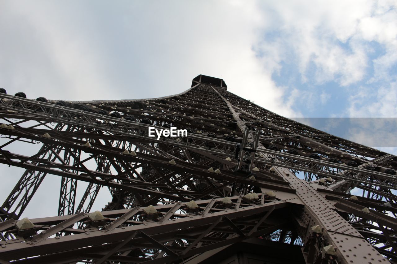 Low angle view of eiffel tower against sky in city