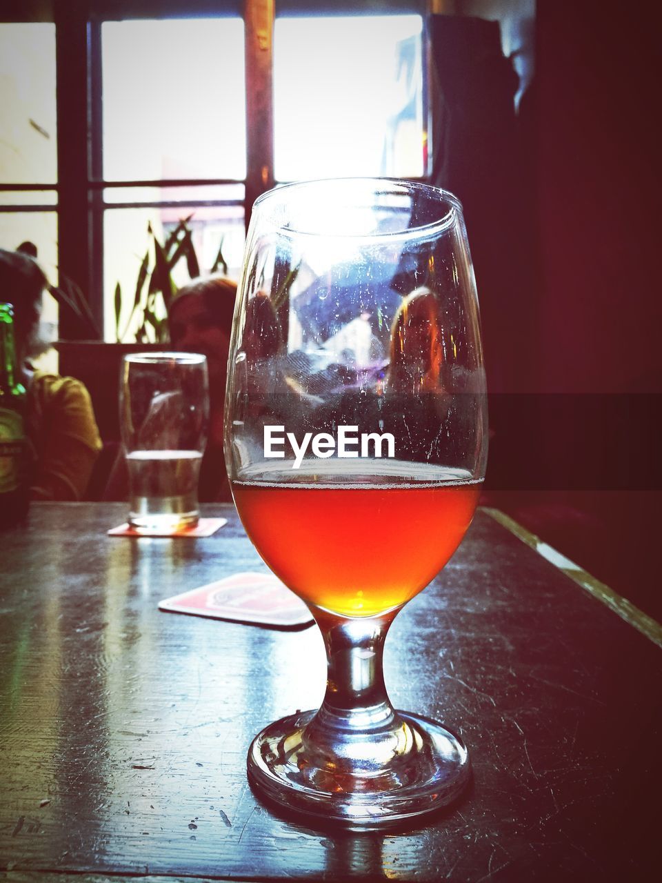 Close-up of beer in glass on table