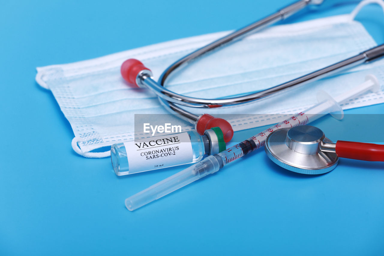 stethoscope, medical supplies, medical instrument, healthcare and medicine, medical equipment, blue, hospital, blue background, studio shot, medical, colored background, indoors, doctor, care, illness, occupation, medicine, surgical equipment, medical exam, close-up, glasses, surgery, group of objects, blood