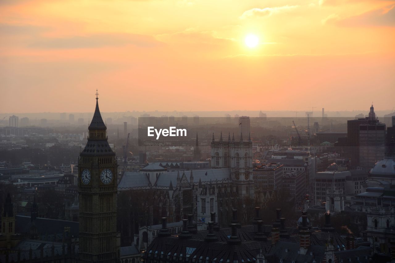 Cityscape against sky during sunset