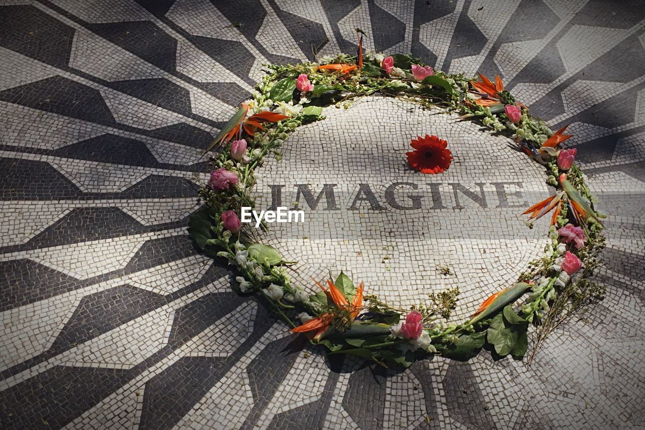 High angle view of text with flower decoration at central park