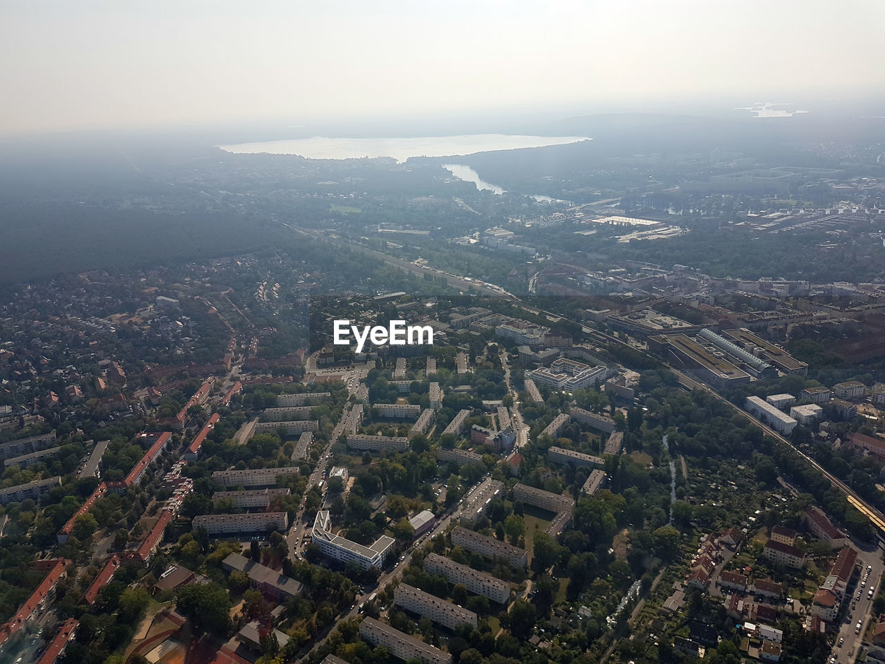 AERIAL VIEW OF CITY AND BUILDINGS AGAINST SKY