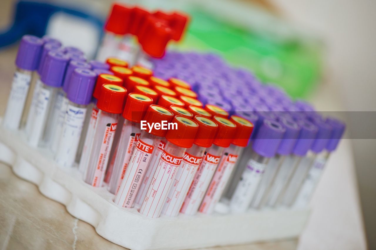 Close-up of test tube rack on table